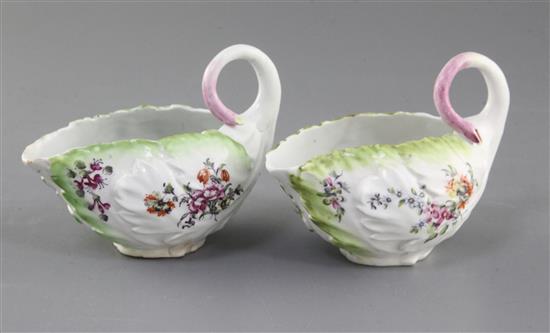 A pair of Derby leaf-moulded small sauceboats, c.1756-9, l. 12.5cm, firing faults